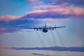 Antidotum Airshow Leszno 2023 and acrobatic shows full of smoke of C-130 Hercules plane on a cloudy