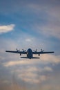 Antidotum Airshow Leszno 2023 and acrobatic shows full of smoke of C-130 Hercules plane on a cloudy