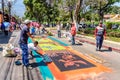 Making Holy Thursday dyed sawdust procession carpet, Antigua, Gu