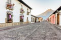 Colonial street & Agua volcano, Antigua, Guatemala Royalty Free Stock Photo