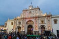 ANTIGUA, GUATEMALA - MARCH 25, 2016: Crowds of people in front of San Jose cathedral on Plaza Mayor square in Antigua