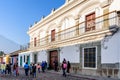 White colonial house & Agua volcano slope in Antigua, Guatemala Royalty Free Stock Photo