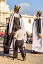 Man gets inside gigante in central plaza, Antigua, Guatemala