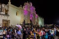 ANTIGUA, GUATEMALA - MARCH 25, 2016: Participants of the procession on Good Friday pass the Cathedral of Santiago in
