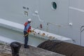 Worker Scrubbing Ship