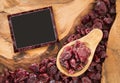 Dried cranberries on the wooden table - Vaccinium myrtillus