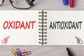 Antioxidant or oxidant written on notebook concept