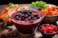 antioxidant-rich detox soup with berries in a crystal bowl