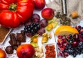 Antioxidants, resveratrol food as green tea, grape, blueberry, apricot, apple, cocoa, tomatoes, pomegranate, physalis, dark Royalty Free Stock Photo