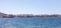 Antiparos island Cyclades Greece. Panoramic view of harbor buildings sea boats blue sky Royalty Free Stock Photo