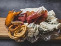 Antipasti and catering platter with different meat and cheese products Royalty Free Stock Photo