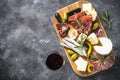 Antipasto board with sliced meat, ham, salami, cheese, olives an Royalty Free Stock Photo