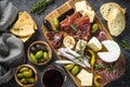 Antipasto board with sliced meat, ham, salami, cheese, olives an Royalty Free Stock Photo