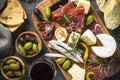 Antipasto board with sliced meat, ham, salami, cheese, olives an Royalty Free Stock Photo