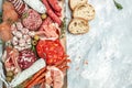 Antipasto meat board. catering platter with bacon, jamon, sausage and wine. Food recipe background. Close up Royalty Free Stock Photo