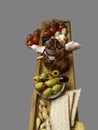 Antipasto Platter Cold meat plate with grissini bread sticks, olives, tomatoes, quail eggs on wooden board Royalty Free Stock Photo