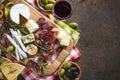 Antipasto - sliced meat, ham, salami, cheese, olives on wooden b Royalty Free Stock Photo