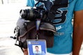 A photographer looks for tourists willing to have their pictures taken at the garden park Royalty Free Stock Photo