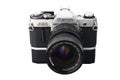 Old and vintage single lens reflex or SLR Canon AE-1 35mm film camera Royalty Free Stock Photo