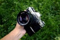 Old and vintage single lens reflex or SLR Canon AE-1 35mm film camera Royalty Free Stock Photo