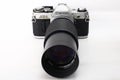 Old and vintage single lens reflex or SLR Canon AE-1 35mm film camera Royalty Free Stock Photo