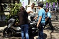 Catholic church minister of the Antipolo Cathedral bless a new motorcycle with prayers holy water