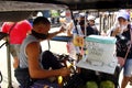 Vendor serves coconut juice as quarantine rules eased up during the Covid 19 virus outbreak