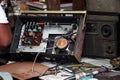 Old antique radio. Preparation for Mahalaya. Man is repairing old radio
