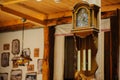 Antiquarian wooden clock with a pendulum Royalty Free Stock Photo