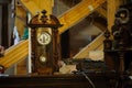 Antiquarian wooden clock with a pendulum Royalty Free Stock Photo