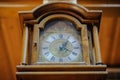 Antiquarian wooden clock with a pendulum Royalty Free Stock Photo