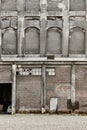 Antique abandoned brick and concrete warehouse facade. Norway Royalty Free Stock Photo