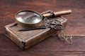 Antique accessories wooden box, old vintage retro scissors and magnifying glass Royalty Free Stock Photo