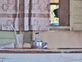 Antique Aluminum Kettle and empty glass with tube.