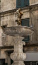 Antique / ancient roman style fountain in Genoa, Italy Royalty Free Stock Photo