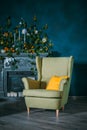 Antique arm chair in light green retro sixties seventies style isolated in room.Still Life of Vintage Green Arm Chair