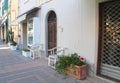 Antique armchairs and flower pots