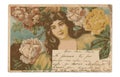 Antique art deco postcard with glamorous lady and roses