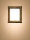 Antique art fair gallery frame on beige wall at auction house or museum exhibition, blank template with empty white