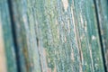 Retro detail of old weathered door with green crackle paint
