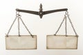 Antique balance scale with empty tags on display against a neutral backdrop Royalty Free Stock Photo
