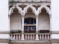 Antique balcony in the Gothic style on a building facade Royalty Free Stock Photo