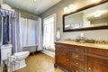 Antique bathroom interior with claw foot tub