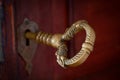 Antique beautiful bronze key in a door Royalty Free Stock Photo