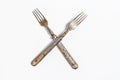 Antique metal rusty fork on a white background Royalty Free Stock Photo