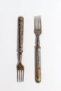 Antique metal rusty fork on a white background Royalty Free Stock Photo