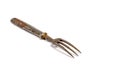 Antique metal rusty fork on a white background Royalty Free Stock Photo