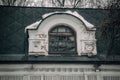 Antique beautiful wooden window. Stone wall of an old building.