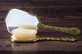 Antique hand mirror and hair brush Royalty Free Stock Photo