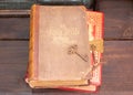 An antique bible and another book on a wooden shelf with a few old skeleton keys Royalty Free Stock Photo